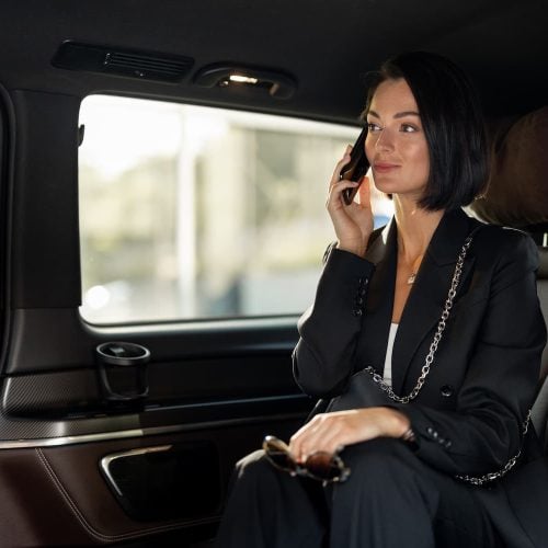business-lady-with-phone-in-car-2025-03-18-07-40-29-utc-1.jpg