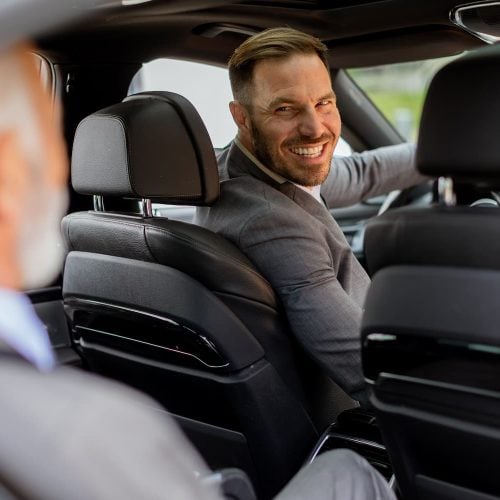 smiling-passenger-engaging-in-friendly-conversatio-2025-02-21-09-05-15-utc-1.jpg